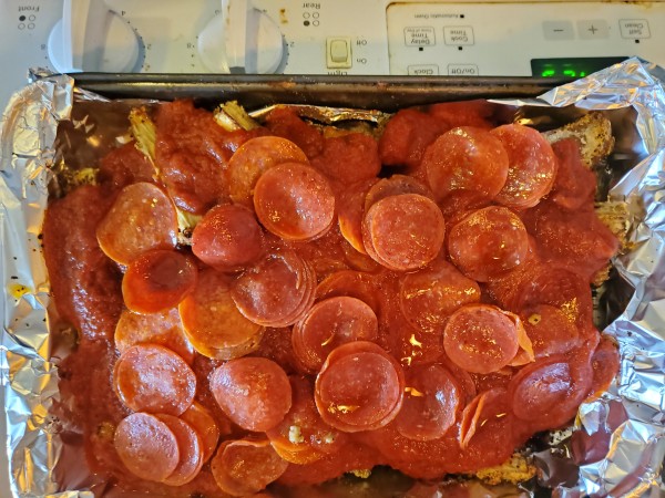 Prego sauce topped with spicy pepperoni