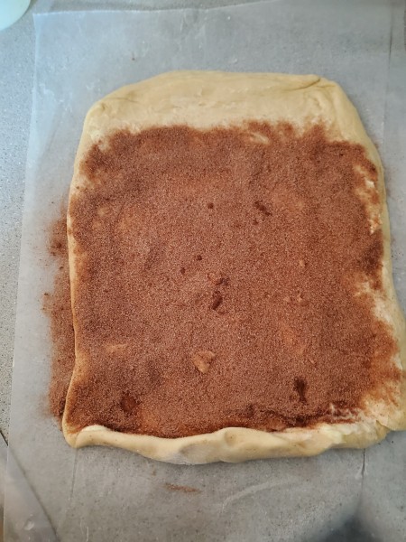 rolled out the dough to a rectangle buttered and sprinkled with cinnamon sugar