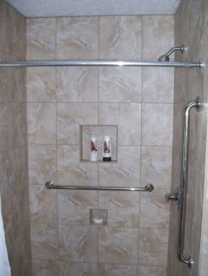 shower interior with grab bars everywhere