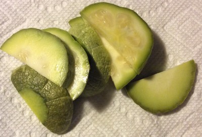 Baked, sliced racket ball sized immature Uncle David's squash